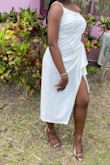 I got this dress in white. I used the size chart and my dress fit perfectly. Also, the material is so soft and it's a great quality. I am so happy with my purchase and I 100% recommend!
*I cropped out my face for privacy reason but i assure you that I love this dress! - Jael S.