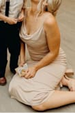 I was so freaking obsessed with this dress. I purchased it for my sister's wedding and cannot explain how much I loved it. Super flattering and comfortable. I received tons of compliments on it. HIGHLY recommend!! - Sam C.