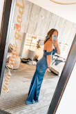 I love this dress! I wore it for my cousin's black-tie wedding and it was a hit. I got so many compliments. The length is long, but nothing some heels couldn't fix. I also got the slit to go further down. It separated at my hip and was too much to dance with if not. Also keep in mind, you could adjust the straps to be on your shoulders. - Brittany L.