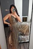 The material is unique and beautiful, and the top part fit very well.  However, the legs looked a lot wider and more billowy than they did on the model - there was so much excess material, it looked like a maxi-length dress on me.  If Lulu's made this jumpsuit with a tapered leg, or as a top or dress, I would buy it in a heartbeat. - Nina D.