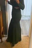 I wanted to love this dress but a couple things were just different than I expected. First, the slit was HIGH and permanently open if that makes sense. It didn't just show when you walked, if you were standing still there is still a very noticeable slit. Second, it was form fitting around the butt, so it kind of hugged your bottom and then flared out instead of a typical a-line style dress. The material was really nice though and it seemed true to size. - Rachel B.