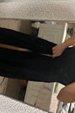 Extremely high slit I am on the fence about returning it and it is very very long. I will need to make alterations to this dress if I keep it. - Lilian H.