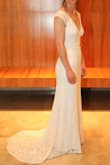 Loved this dress! It followed my curves without being too low-cut or tight. The only alteration needed was hemming. I added a bustle to keep the train up when outside for pictures. - Katherine S.