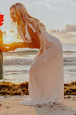 This dress is everything I wanted! The fit is perfect and looks so elegant, yet beach at the same time. Perfect for my family photos. - Shannon D.