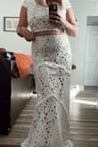 This set is perfect! The top fits really well and the skirt is the perfect length for heels! I love the thick lace details and the underskirt being sewn in! The zipper sticks a little bit with a bit of oil it zips perfect now! - Courtney S.