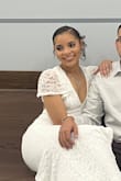 I wore this for my courthouse wedding, I received so many compliments!!!!! People asked if I bought it at a luxury boutique and were shocked when I told them no! Its very flattering for pear shaped bodies and girls like me with smaller chests. I was hesitant to order a small based off the reviews but the small fit perfectly and medium would have been to big! The slit in the front does come a little high so be mindful when you constantly have to sit and stand back up. Other than making small adjustments throughout the day, I absolutely loved this and felt so beautiful wearing it. HIGHLY RECOMMEND - Elisa J.