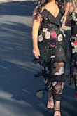 I absolutely loved this dress. I ordered a large which definitely felt a little big, especially around the midsection (which you can kind of see in the pics), but I don't think that I would size down. The design is so unique and I got compliments all night. I rarely rewear dresses but I think I'll be holding onto this one for the future!!! - Samantha O.