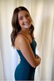 This dress is just what I was looking for, for a Ball. It's very in- style and the perfect shade of green. I'm pretty tall as is and I also wore heels. The size Medium went all the way down to my ankles, which is exactly what I wanted! It fit perfectly and I got a lot of compliments on it. I love this dress. - Emily J.