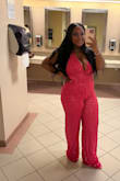 I wore this jumpsuit to the Lizzo concert and received so. many. COMPLIMENTS! The color is stunning and the sequins shine so bright. I am on the shorter side, so even with heels, the jumpsuit was way too long for me. Also, the halter top of the jumpsuit was loose, so I think I could've sized down to the LARGE. I'm obsessed with this piece and can't wait to wear it again! - Briana S.