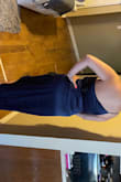 Dress fits perfectly, it does have a zipper on the side so makes it easier to put on. I did wear this dress without a bra so it wouldn't have to feel so tight. - Amy C.