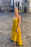 This dress is truly stunning in person. The fabric shimmers and it is so comfortable to wear. I bought it for my honeymoon and spent the day walking around a city. I felt gorgeous and comfortable in it the whole time! I actually also bought it in white for my rehearsal dinner for my wedding too because I loved it so much. One of my favorite dresses! - Carolyn B.