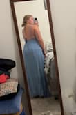 I was weary of ordering this one because I wasn't a huge fan of the front in picture reviews but I needed a blue dress for the "something blue crew" that I am in for my cousin's wedding. I ordered it along w two others, and the front of this one is just so plain. It fit just fine though, the back straps were a little snugger than I liked but I could've made it work if I needed to. Also a tad bit long with 3in heels, but I'm short so I'm used to dealing with that. - Erica B.