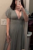 I really like how it fits overall, however, it was too long for me. I had to get the dress hemmed. The picture shows me wearing 4" heels and it is still too long. It fits nicely in the chest and shoulders and looks really flattering. - Samantha G.