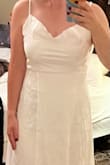 I ordered this dress to wear for my rehearsal dinner and I love it! The straps were a little too long, but thankfully they can be adjusted so it's not inappropriate in the chest area. I'm about 5'5 and around 145lbs, and the Medium fit well. The satin material is lovely! - Kelsey D.