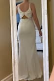 Very pretty and nice material. I am very small on top (shoulders and bust) so it didn't fit great on top. I should have ordered smaller. I ended up returning as it wasn't quite what I was looking for - Sarah S.