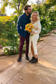 I got married in this dress, and it was perfect. I received so many compliments! The best part about this dress is I know I'll wear it again! It is well made, soft, warm, and flattering. The only thing I was not particularly fond of is that the slit is a bit more centered and I would have preferred it more to the side. Additionally, I did cut out the strip of fabric on the back so I could show off my tattoo more. The dress stayed in its place without it. - Sarah S.