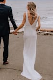 I don't know about you, but wedding dress shopping is crazy. Not only is it next to impossible to find a dress under $2000, but nothing fits the way you want, and it's all just very expensive and overwhelming. I'm not going to lie, my Pinterest board did not really depict this style of dress, but there was something about it that kept me coming back to it. When my fiance and I decided to last minute elope, I pulled the trigger on 3 dresses off of Lulus (this one included). It fit AMAZING and the detailing is so insanely good considering the price! It runs a little long, but I didn't wear heels on my wedding day so that's probably why. I had a seamstress sew in a bra (cost me $50 for her to do this) and it was game changer for the bust, although not completely necessary. The seamstress was completely shocked at the price of this dress considering how well it was made and detailed. I seriously don't know why you would spend $2000+ on anything else. I am absolutely in love with this dress! - Sarah F.