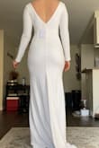 I can't express how pleased I am with this dress! I'm having a winter wedding and wanted to make sure I wasn't absolutely freezing on my wedding day. I ordered a few long-sleeve dresses from Lulus and the moment I tried this one on; STUNNING! It's simple, *stretchyyy*, and screams gorgeous. The detailing on the back paired with the beautiful neckline/back? *chef's kiss*  To think I was anti-mermaid dress! Exactly what I was looking for for under $100. A girl couldn't be any happier - Katie G.