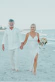 This dress was way better than I thought. It is like liquid when you walk.  Stunning and jaw-dropping.  I wore it for my wedding in Miami. It's simply the most gorgeous dress. - Tammy J.