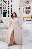 I'm 5'2 140 pounds. The site recommended M size but I need to exchange for a Large size. I love the exchange was easy and quick.  The only reason I don't give a 5 start is because it should be also for Petite women :) other than that is a beautiful dress nice fabric, I recommend:) - Omalia W.