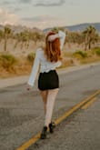 I always pack this top for my summer vacays. It works as a bathing suit cover-up or a cute crop with a bralette underneath. Recently wore it for photos for my Bach trip and I love how they came out! - Laurie S.