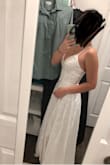 I truly love everything about this dress. It made me feel beautiful and comfortable as soon as I put it on. The cut is super flattering. The straps are adjustable. The satin intermixed with the floral pattern is so subtle and pretty. I returned it because I am looking for a wedding dress that is a bit more fancy than this, but if I had to wear this dress on my wedding day I wouldnt be complaining! - Claire G.