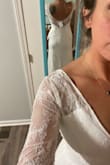 I was skeptical about this dress with the price point being so cheap, but this is the perfect dress! The fabric is heavy and not see through, the lace is very soft. It fit me so well! I love everything about it! My only small issue is the zipper tends to get stuck, but it stretches enough I can lift it straight above my head to remove if needed. - Whitney C.