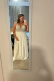 I bought this as my wedding dress for a small beach wedding and absolutely love it.  I purchased the size 10 and will likely need to get the back altered a bit (or ya know, get in a little bit better shape so it sits well), but it's truly so beautiful!  I thought I would want to get a white inlay to back the mesh on the front - 1 to make it a little classier and because I thought the padding where the cups are wouldn't look great, but I don't think I'll be doing that anymore, even. my mom agreed she loved it as is!  These pics are wearing it with a sticky, backless bra, but I've tried it on without one as well because I was worried about that and it was about the same.  The mirrored picture shows it a little more fitted on the top, my mom is crouching behind me holding the straps. - Crystal T.