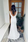 I wear this dress for my wedding and it was beautiful, little bit long cause I didn't want to wear heels. Has a inside fabric, is a bit heavy and thick but when I put it on I knew this was the one! - Brenda M.