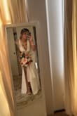 Other than the dress being just a tad too long (which was expected since I'm short) it fit perfectly! I bought this dress because I didn't like my first dress after alterations. I felt so beautiful AND comfortable. So glad I chose this dress! Don't mind the dirty mirror lol - Alexis L.