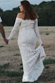 Gorgeous dress. The small was too tight in the middle, so I had to go to a M. But the busy area was too big for me, so I had to end up safety pinning it. It was fine for engagement pictures though! - Stacy R.