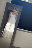 I wore this jumpsuit on my wedding day at the reception and I absolutely loved it. I did however get the length altered because it was extremely long. I also had the slit sewn slightly due to wearing shapewear. It is slightly see-through so I wore nipple covers and nude shapewear. After the changes it was perfect! - Shawnie J.