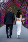 I am in love with this dress. It is a perfect courthouse/ small wedding dress.
It is an amazing dress and good quality.
It has two layers of fabric and built in cup. I had to take half inch off of the hem because even with 4" hells it was a little too long. (I am 5'3"). - Angelita S.
