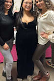I am 7 months pregnant and I wore this to my baby shower and I loved it! It has a LOT of stretch to it! I bought an XL. - Kristal W.