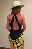 I am very particular about my swimsuits.  The fabric is very soft, comfortable, and flexible while providing excellent coverage.  I feel very sexy in this piece!  This suit provides great coverage when I need something more than my traditional bikini.  This piece is easy to transition from the pool to a night on the town with a great skirt.  Very happy with my purchase and would recommend. - Doug E.