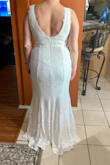 I used the size assessment to order 4 dresses which were all beautiful but this one really worked for me. I love the color, white lace with a tan slip under. It's very pretty and different. The style compliments my curves and it was supportive in the breast area. The Lulus belt can be added and I'm still deciding if I want to wear it or not. Looks beautiful either way. - Misty D.