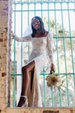 I absolutely loved this dress from the moment I tried it on. It fit my petite body perfectly and fit my personal style so well. It gave me that modern, retro, classic 90's inspired lace detail I wanted from the start. Everyone was speechless when I walked down the aisle and it made my confidence soar! Loved it and will remember it forever. - Precious H.