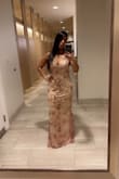 It's a beautiful dress but maybe bc my torso is short or not sure if the dress was defective, the dress design was not fitting on me in S size it was too tight on my ribs. I bought the M size and it was looser on my ribs and I felt more comfortable but it was also loose on my breast area although I don't have a small breast. So I had to tight a lot the dress straps and to used push ups bra to fill the gap - Isabel A.