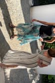 Fabric is nice quality and comfortable to the touch, colors and design are flattering (front of the dress concealed my stomach pooch well :-). I typically get M because I don't like things too tight on me but this looked flowy and forgiving from the pics so I got a S, and if fit perfect! Perfect dress for the summer, beach day, beach vaca etc - Raeghan M.