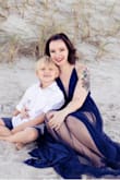 Bought this dress for family portraits on the beach and it was the PERFECT dress for this! Love how light weight and flowy it is, and the slits give it a hint of sexy that I also
love! - Shayla B.