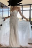 This dress is EXACTLY what I tried on at one of the trendy bridal boutiques - only instead of it being 4 different custom dresses that would all be created to my liking and priced at $5K+... it was already perfect and SO much cheaper! The colors and everything were perfect, fit was amazing, lightweight and comfy. 

Say NO to the (expensive) dress and YES to ~savin' yo money~ :) - Natalie D.