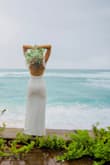 My husband and I never had a formal wedding. We decided after 12 years of marriage that it was time. I purchased 5 different dresses from Lulus but this by far was the one!! The dress has a little bit of stretch to it, so its great for a woman with some curves. Dont be put off by the stretch because the ornate design of the lace gives off some expensive vibes. I traveled with the dress to Hawaii and there were no issues stuffing it into my luggage. 5 min with a steamer and it was good to go. The length is perfect for us tall ladies and the fabric is not see through (even in the rain!) I dont even need to comment on the price.. its a steal! - Anna L.