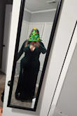 This dress is a stunner. The slit is much higher than expected. (Pictured wearing spanx rolled up on slit side with 4 inch heels) The fabric was great quality and a good weight. There was a decent amount of stretch too making it comfortable while still skimming over the body. I bought this for a NYE wedding, and ultimately ended up returning the dress. 1. It was a bit too revealing to comfortably dance all night without worrying about a wardrobe malfunctuon and 2. It looked to similar to the mother of the bride's dress. I would repurchase if the event was better suited for it. - Alexis R.