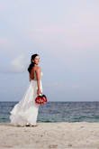 As soon as I saw this dress I knew I had to have it for our beach wedding in Mexico! I was blown away when it arrived, the quality and details it's absolutely gorgeous! It is a bit long so I did have it hemmed but other than that it fit perfectly! - Sabrina H.