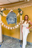 I wore this for my bridal shower and added a belt! The medium was more form fitting so I decided to go with the large so I had room to move around. The length was perfect for my height. I received so many compliments and felt so beautiful. I would highly recommend! - Jessica W.