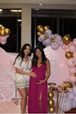I wore this dress for my baby shower in my week 32 - Maria M.