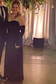 I felt very glam and cool in this dress for a winter black tie wedding in Chicago. Very happy with fit, I did have to get it hemmed  but no big deal. 

However, the gloves completely stained my arms by the end of the night& 
It didn't ruin anything and easily washed off but be weary if the gloves come off in public! - Mackenzie C.