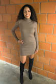 I looove this dress! My husband looked shocked when he saw me, especially with the knee-high boots from Lulus. I love how flattering the dress is but without actually showing a lot of skin. Rides up a little but not enough to cause concern. It's long enough and I'm on the taller side :) - Desiray B.