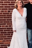 Loved the dress, it was big in my shoulders and the zipper wouldn't work properly so I did have it altered to fit and a new zipper put in, and some length taken off, but overall was satisfied with the look of it and how comfortable it was! - Chsrlotte A.