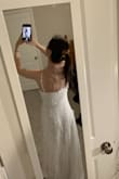 This dress is beautiful quality, especially for such a low price. The dress was exactly as pictured and the sizing was as expected. I did return and re-order a size down to an XXS, but XS also fit well. I received the dress 4 days after ordering and the return process was very smooth. Great experience overall! 

The dress is super lightweight and comfortable. I'll be wearing it for my wedding with a few minor alterations to make the dress look a little more formal (thinking of adding some faux buttons to the back and making the straps non-adjustable). Can not recommend this dress enough! - Rhianna L.